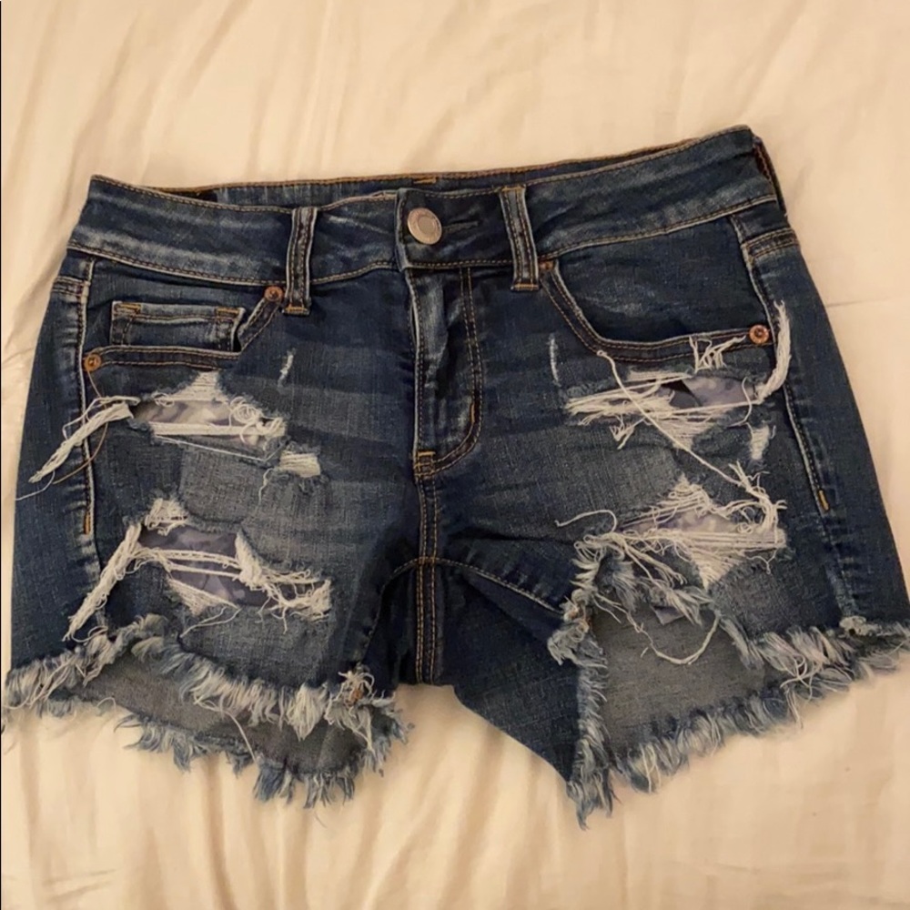 American Eagle Dark Washed Jeans with rips